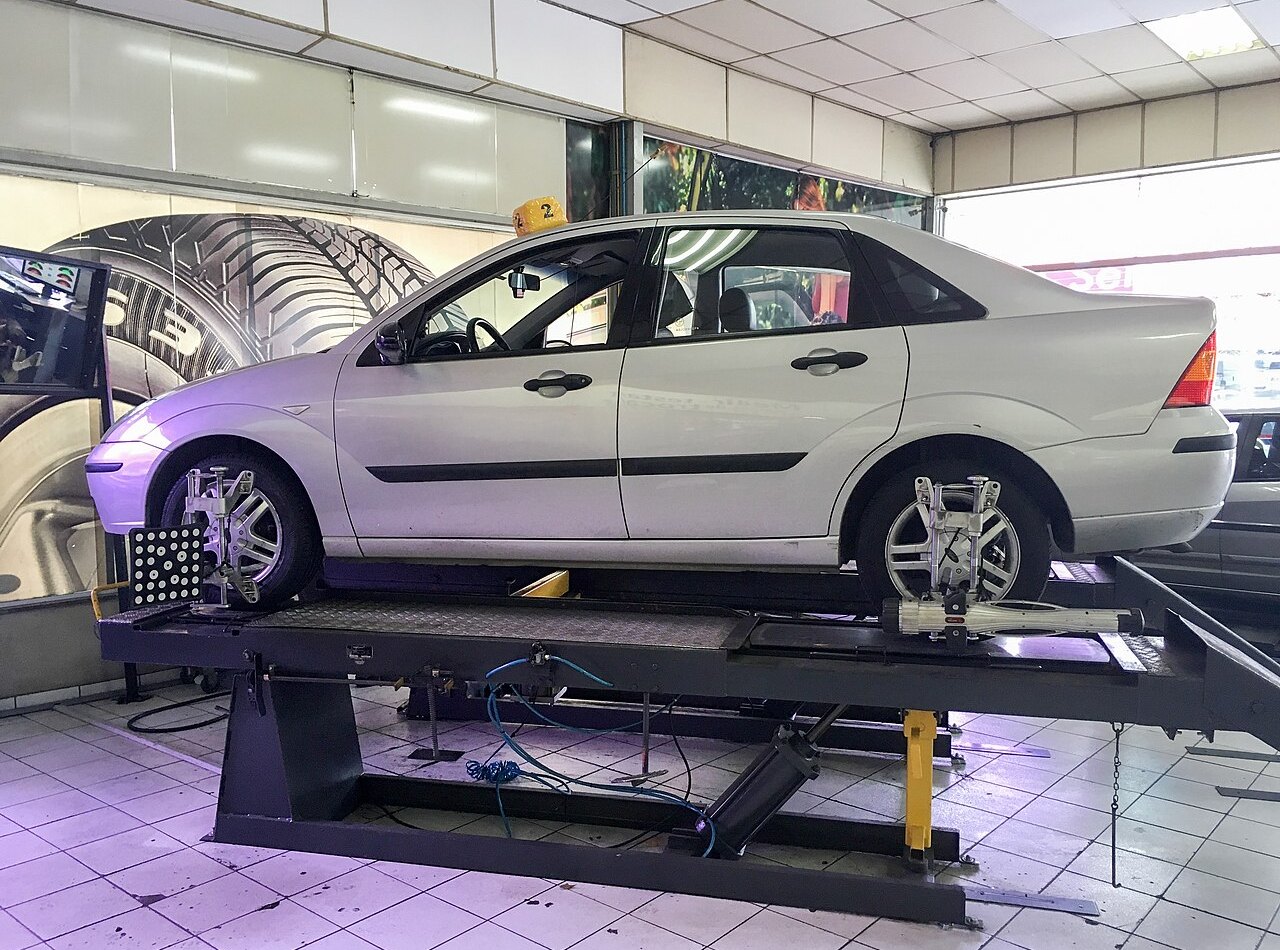 Wheel alignment check on a vehicle pulling to one side